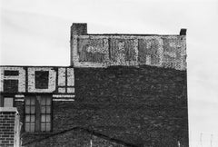 35mm B&W photo of brick building top shot with this camera - but not this lens