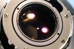 Minolta MD 50mm f1.7 rear lens element  showing some marring along the edge