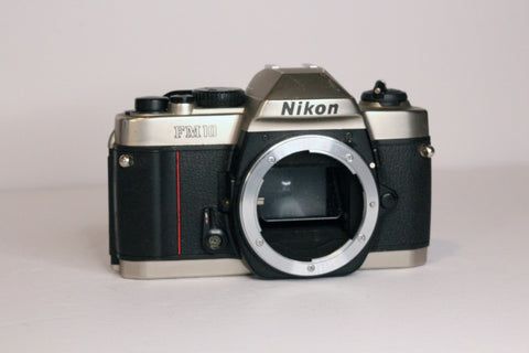Nikon FM10 camera body - works but in very rough conditon - As-Is, Parts/Repair