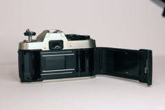Nikon FM10 with film door open seen from the back