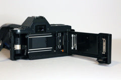 Canon T70 seen from behind with film door opened